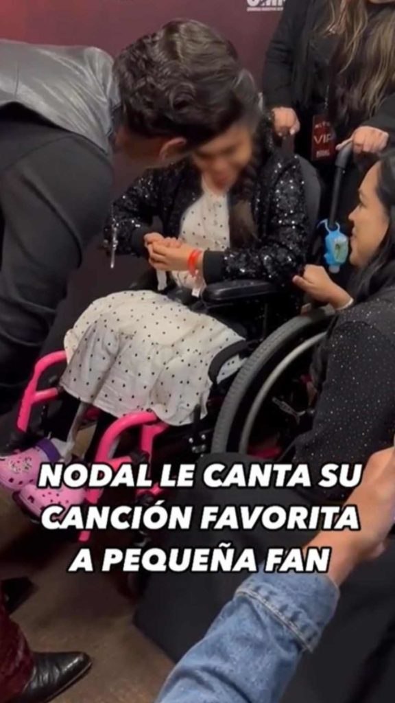 Christian Nodal conmueve al cumplir sueño de pequeña en silla de ruedas.